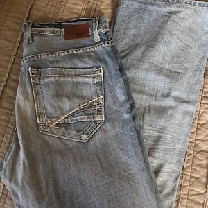 Men’s Buckle jeans.